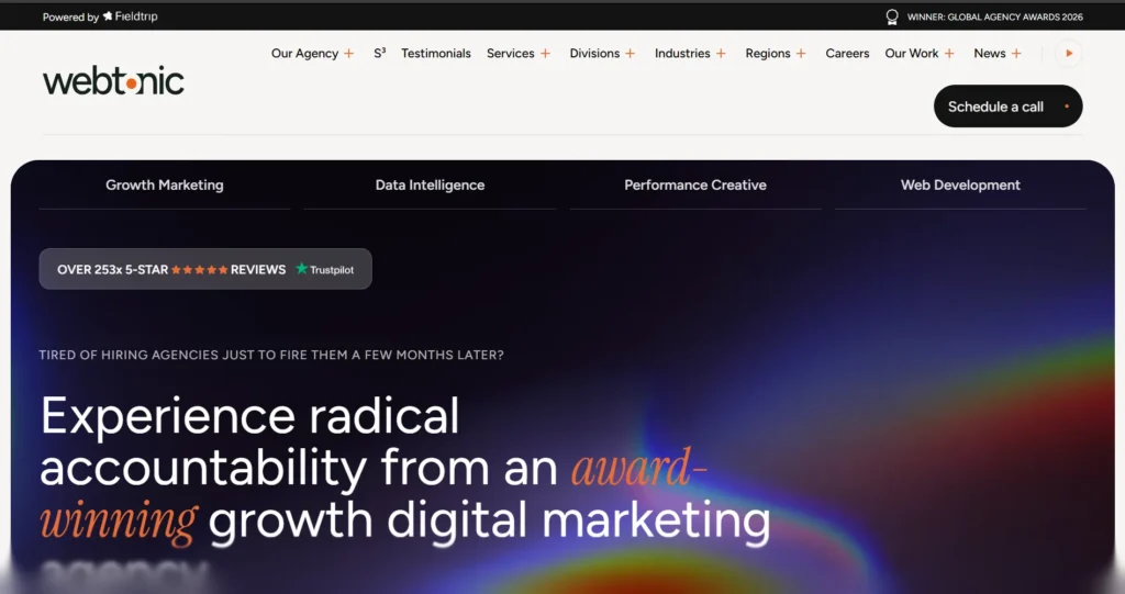 6. Web Tonic: Best for Paid Media Plus SEO Under One Roof; Best digital marketing company in New York 2026 – Manhattan skyline with search and AI icons